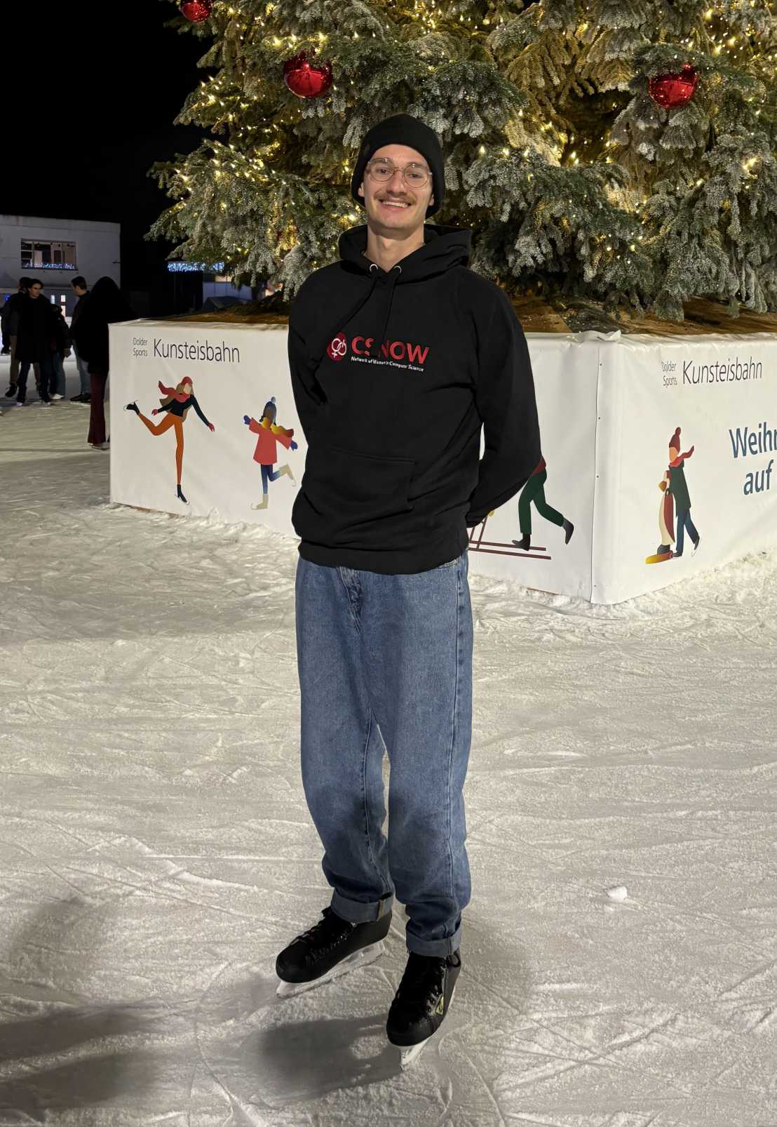 Jesse posing on an ice rink